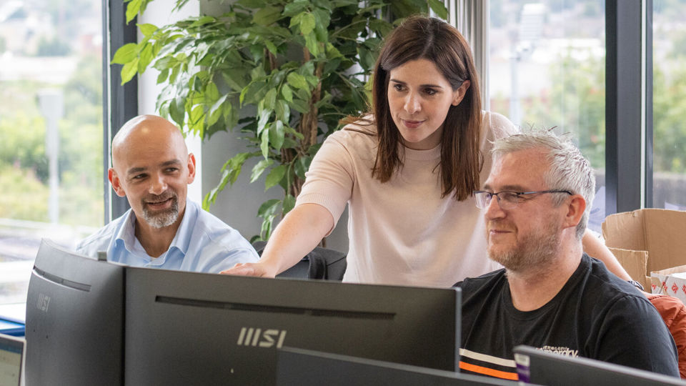 Female IOSH member with colleagues